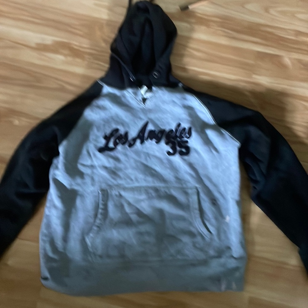 Grey and black sweatshirt it has some stains